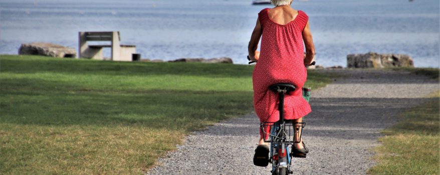 Elderly woman on a bicycle