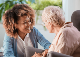 Nurse caring for elderly woman