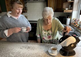 Daughter and mother making tea in the kitchen with the Uccello Kettle