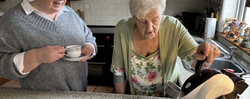 Daughter and mother making tea in the kitchen with the Uccello Kettle