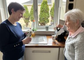 Mother and daughter in the kitchen making tea with the Uccello Kettle
