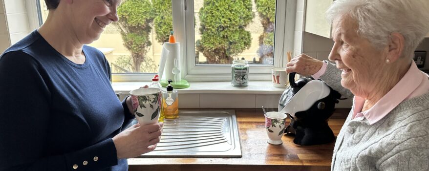 Mother and daughter in the kitchen making tea with the Uccello Kettle