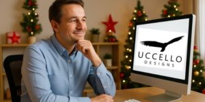 Grown man on his computer look at the Uccello Designs website